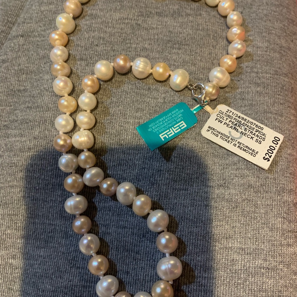 Multicolor freshwater strand of pearls 18 inches. New with original $200 tag att